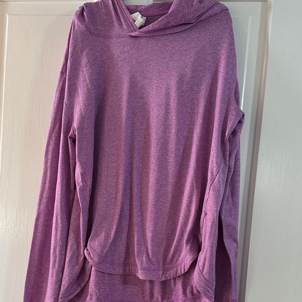 Sportswear top. Super soft short in front and longer in the back.